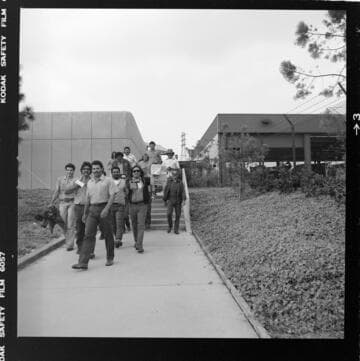 Group of Edison employees leaving an unknown facility