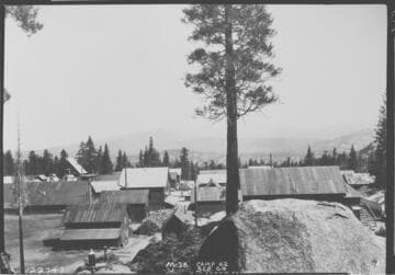 Wide shot on Camp 62 showing buildings and facilities