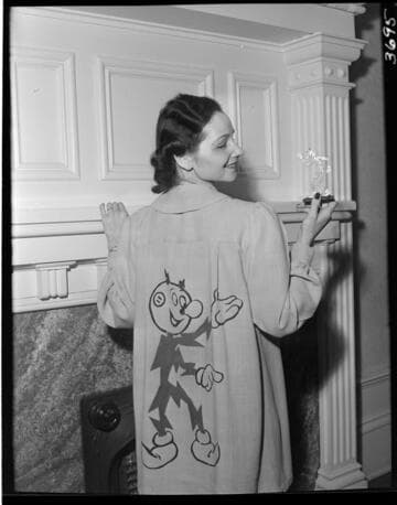 Lady wearing Reddy Kilowatt robe