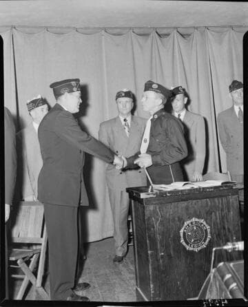 Passing on the gavel at the Edison American Leagion meeting