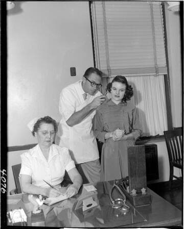 Young lady (new employee) getting medical check
