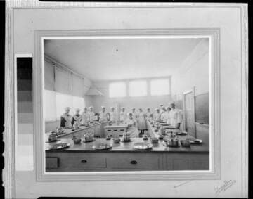 Group of women or nuns in a cooking classroom
