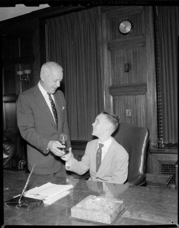 Giving award to eleven-year-old Bobby Carter