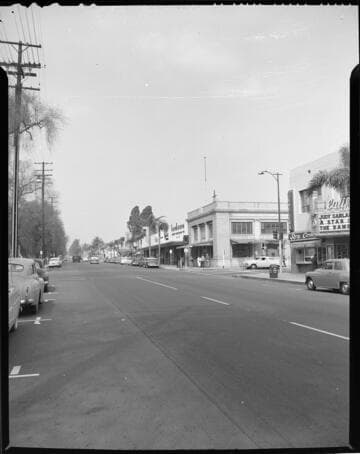 Day & night shots of street lighting in a commercial area