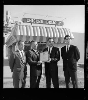 Award presentation to Chicken Delight for total-electric building