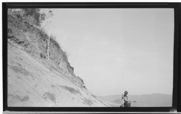Boulder-Chino Transmission Line (3rd) - Showing excavation of soil at and between towers 1 to 2 at mile 103. Rods on centerline