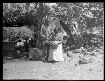 Joe and Mary Jololla, with basket. Yokuts. Tule River Reservation