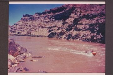Outboard motorboat "Jax" and The Slide in Colorado River
