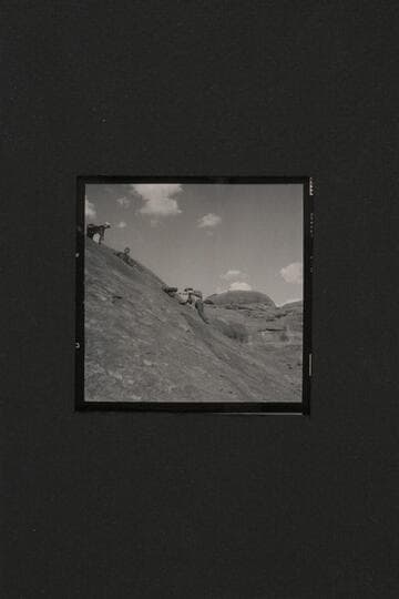 Lowering packs; trail into Anasazi Canyon