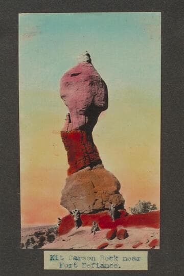 Zahn trip to San Juan placers in a Franklin car.  Kit Carson Rock near Fort Defiance