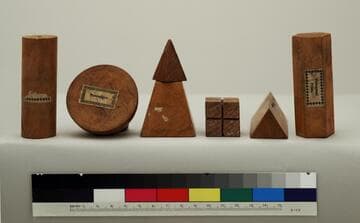Set of six small, geometric wood models