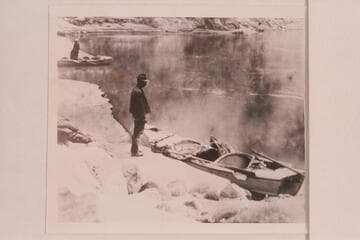Nat Galloway and his boat at the mouth of Bright Angel Creek in Grand Canyon.  Galloway-Stone Voyage of 1909.  The Galloway-Stone design was perfected for lightness during this trip.  Later copies have been heavier