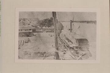 "Mohave" (I) (?)   This photograph shows steamboat landing and ferry at Fort Yuma.  Note the stage coach at lower left