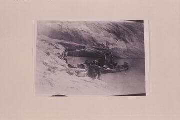 Meeting of the placering crew from Gretchen Bar with a survey party in Glen Canyon.  The placer crew were cruising in the outboard motorboat "Mallard" which is farthest from the camera.  1933, Oct.-Nov