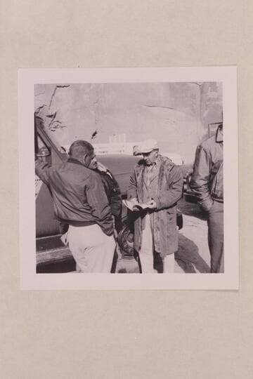 Art Viterelli works out details of filming "The Colorado Story" at camp site below Moab