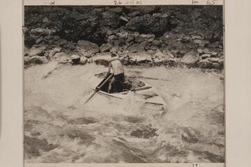 Kent Frost beam-on in Buck Creek Rapid, Hell's Canyon, Snake River.  Note he has dropped the oars in accord with Nevills' idea of handling a boat in rough water