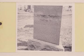 Face of triangular Thompson tombstone in Arlington Cemetery dedicated to Ellen Powell Thompson.  The legend reads:  1849-1911/She hath done what she could