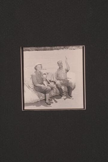 Fern and Bill Davis in the 7-man inflated boat in which they have traveled from Green River, Wyoming, to Bright Angel Creek.  At Paria Riffle