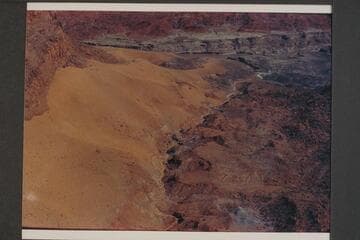 North to mouth of wash at side of The Rincon.  Mile 99.3.  Approximate gauge:  31,000