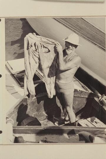 Marston holding pants recovered from cache below Point Sublime.  End of Nevills trip