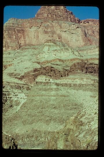 Butte at left bank opposite mouth of Stone Creek. Mile 131 3/4
