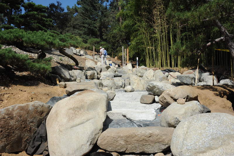 FallingFolsom Men working on Japanese Garden waterfall
